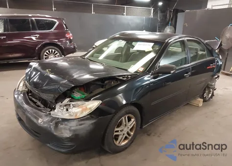 2002 Toyota Camry Le z USA, uszkodzony, nr VIN 4T1BE32K02U584885